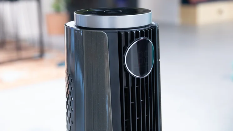 A closeup of the top of the Dreo TurboCool Misting Fan 765S. Its digital display is off