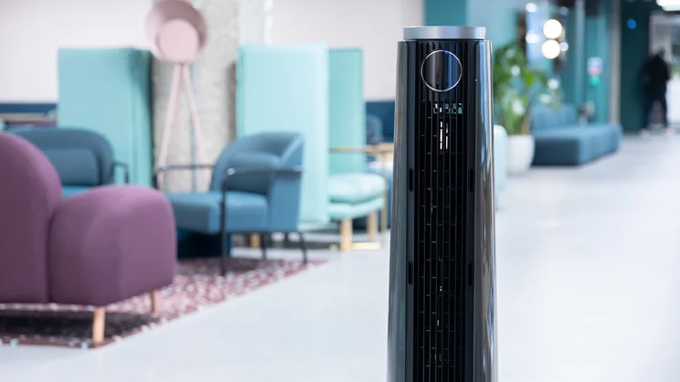 A top half view of the Dreo TurboCool Misting Fan 765S standing in an office