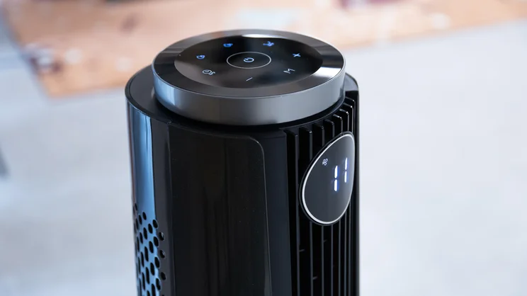 A closeup of the top of the Dreo TurboCool Misting Fan 765S. Its digital display is on