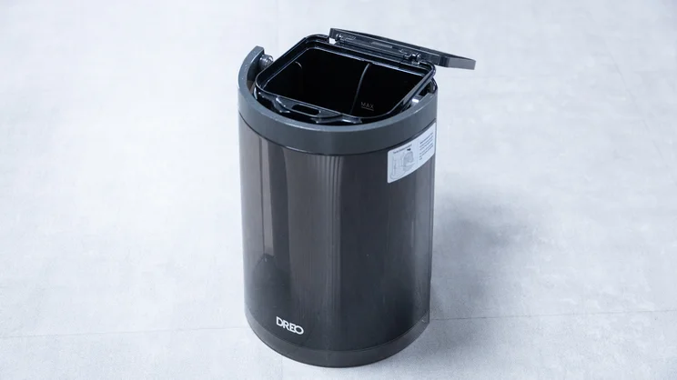 The Dreo TurboCool Misting Fan 765S's water tank, removed from the unit and with lid open