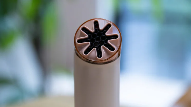 A closeup of the Dyson HushJet Mini Cool's fan head