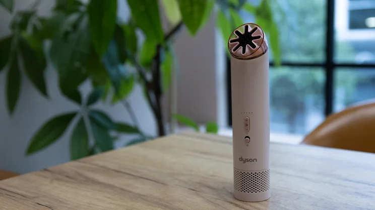 The Dyson HushJet Mini Cool fan standing on an office table