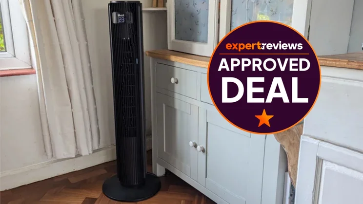 The Levoit Classic Pro Tower Fan in a living room. A roundel badge to the right reads "Expert Reviews Approved Deal"