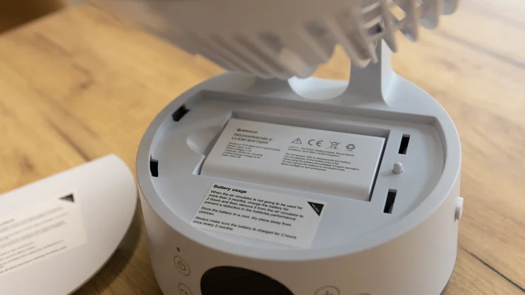 The Meaco Sefte 6in Air Circulator with battery panel open. The battery is sitting in its compartment