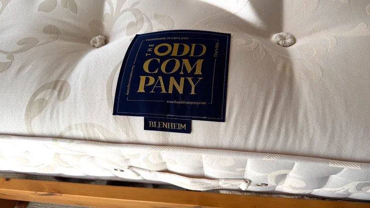 A closeup of the Odd Company Blenheim 1500 mattress' brand label