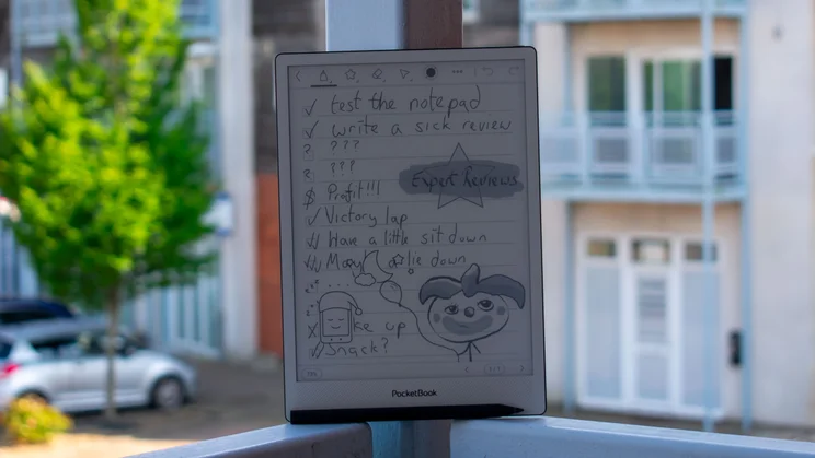 PocketBook InkPad One on a balcony, display in sleep mode