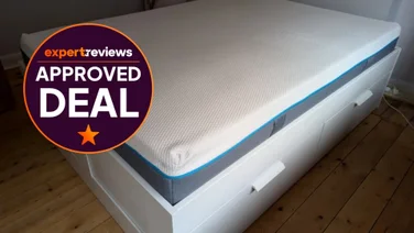 The Simba Hybrid Pro on a white bed frame. In the top right corner, a roundel badge reads "Expert Reviews Approved Deal"