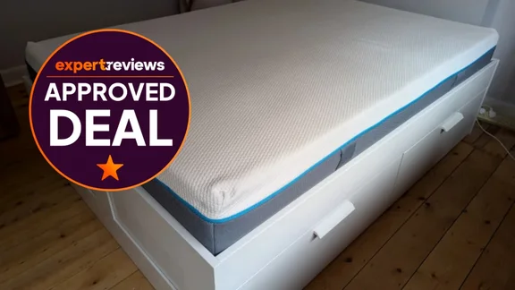 The Simba Hybrid Pro on a white bed frame. In the top right corner, a roundel badge reads "Expert Reviews Approved Deal"