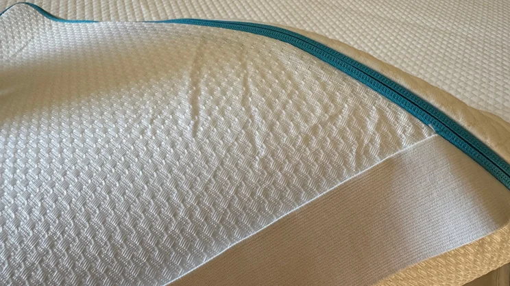 A closeup of the Simba Cool Foam mattress topper's base