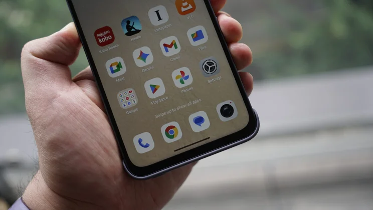 TCL Nxtpaper 70 Pro in hand, bottom of screen view