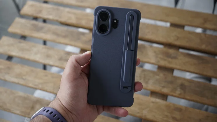TCL Nxtpaper 70 Pro in hand with case, rear view