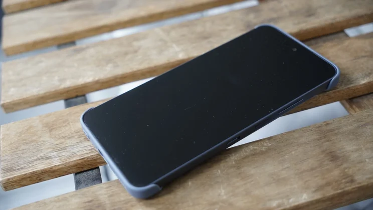 TCL Nxtpaper 70 Pro on a table, showing a scratch on the display
