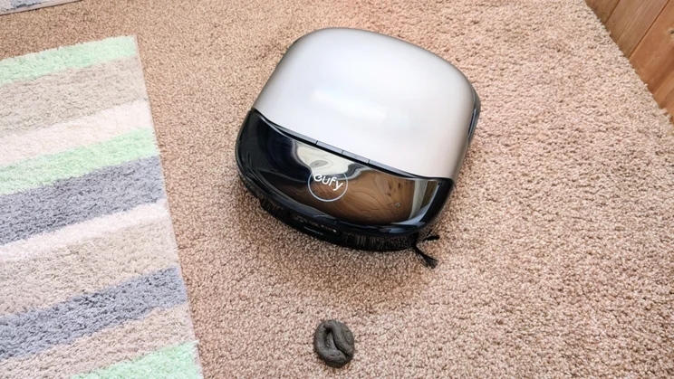 The Eufy Omni S2 pictured from above, cleaning