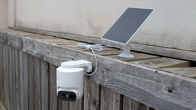 The EufyCam C37 mounted on a wooden fence