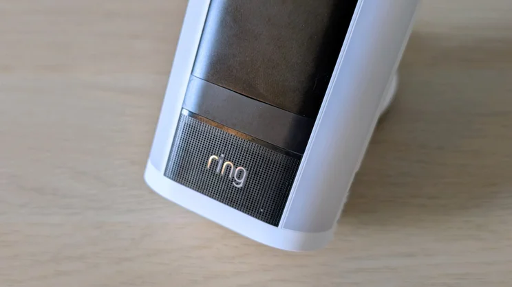 The Ring Spotlight Cam Pro Plug-In (2nd gen) pictured in close up showing the Ring logo