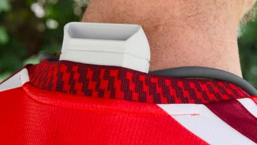 The Sony Reon Pocket Pro Plus pictured being worn under a loose fitting football shirt