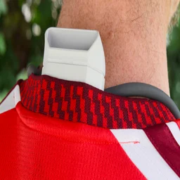 The Sony Reon Pocket Pro Plus pictured being worn under a loose fitting football shirt