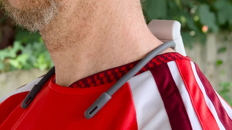 The Sony Reon Pocket Pro Plus pictured from the front right being worn under a football shirt