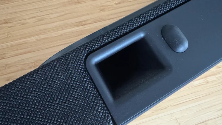 One of the QuietPort bass reflex enclosures on the rear of the Bose Lifestyle Ultra Soundbar