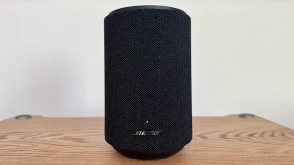 Front view of the Bose Lifestyle Ultra Speaker on a wooden table