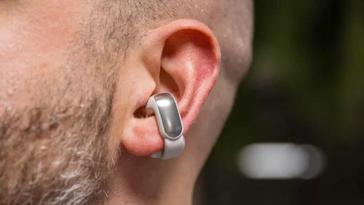 The left earbud of the Bose Ultra Open Earbuds being worn