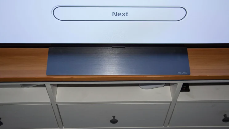 A top-down view of the central plinth stand of the LG C6 OLED TV