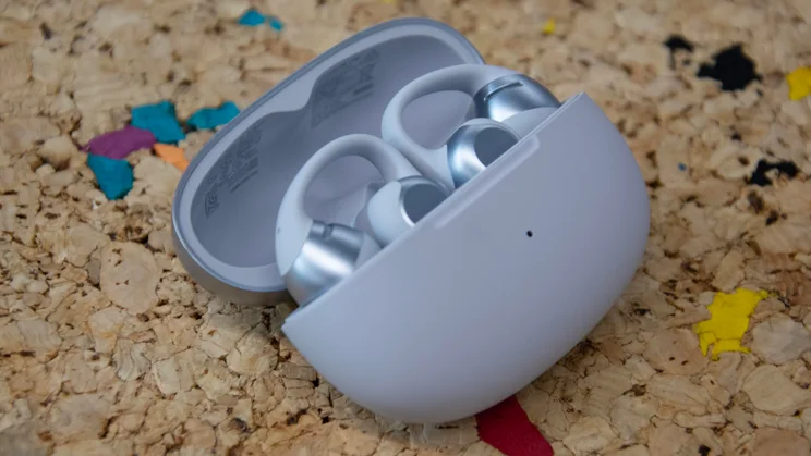 The Shokz OpenDots 2 in their charging case with the lid open