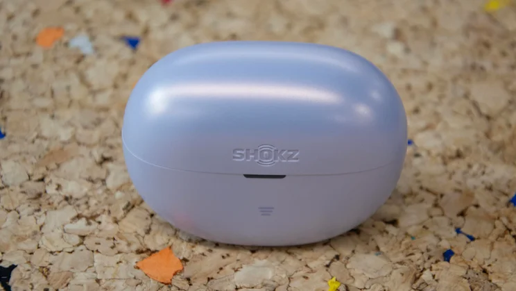 The charging case of the Shokz OpenDots Air with the lid closed