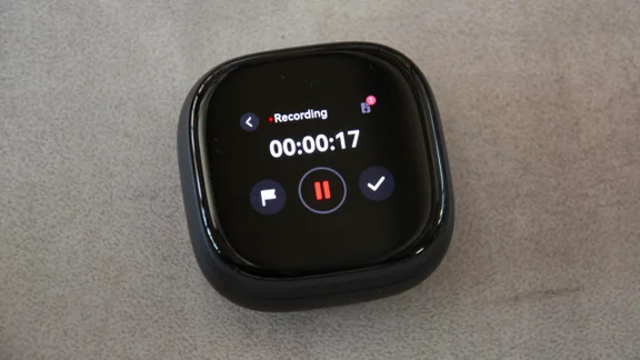 The charging case of the Soundcore Liberty 5 Pro Max wireless earbuds with the lid closed and recording a conversation