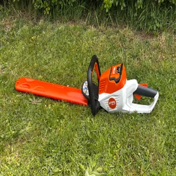 Stihl HSA 50 hedge trimmer - wide shot of entire trimmer on grass