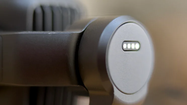 A close up of the accessory contacts on the rear of the DJI OSMO Pocket 4P's head