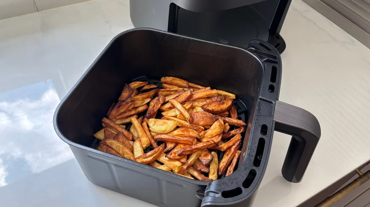 Cooked chips in the larger drawer of the Cosori Turbo Tower air fryer