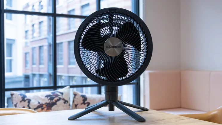 The Dimplex DuoCool 2-in-1 fan, in floor/table mode, on an office table