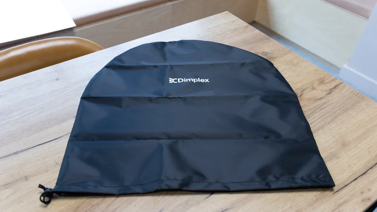 The Dimplex DuoCool 2-in-1 fan covering on a table in an office