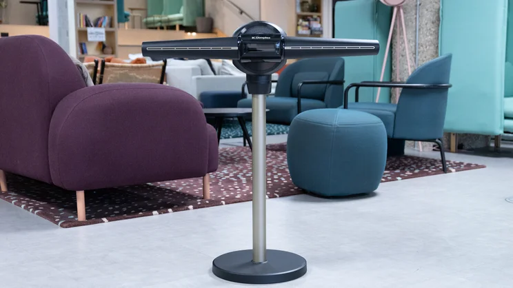 The Dimplex Flexblade tower fan on the floor of an office