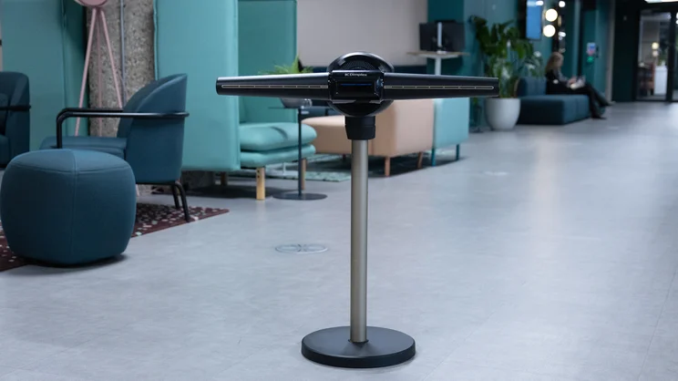 The Dimplex Flexblade tower fan on the floor of an office