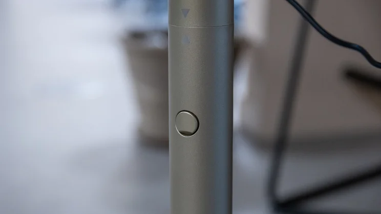 A closeup of the Dimplex Flexblade tower fan's stem