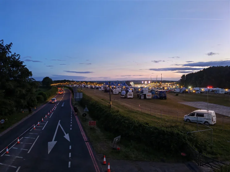 A festival viewed from a distance at night