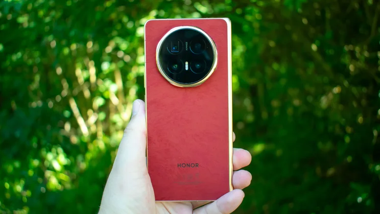 Honor Magic V6 folded in hand, rear view