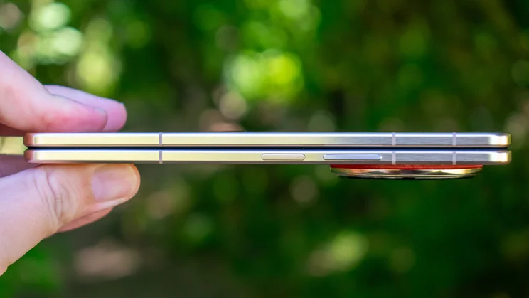 Honor Magic V6 folded in hand, side view