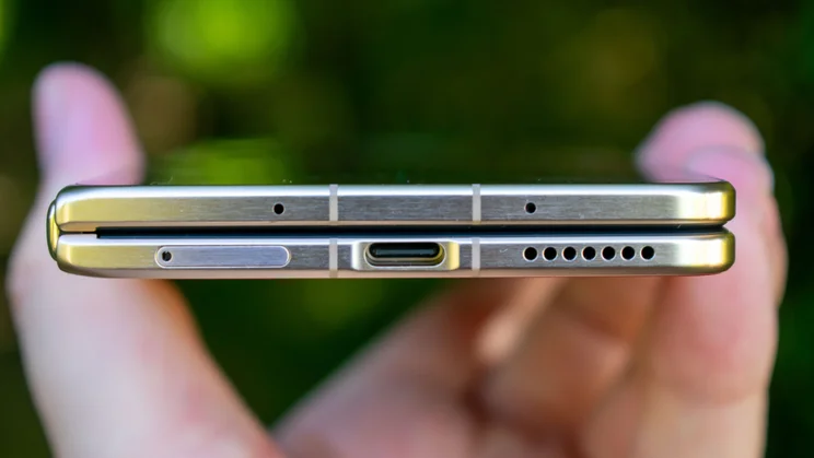 Honor Magic V6 folded in hand, bottom edge