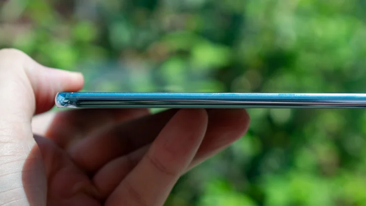 Huawei MatePad Pro Max in hand, side view