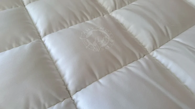 A closeup of the Hypnos Inspired By Nature Wool and Latex Enhancer's surface