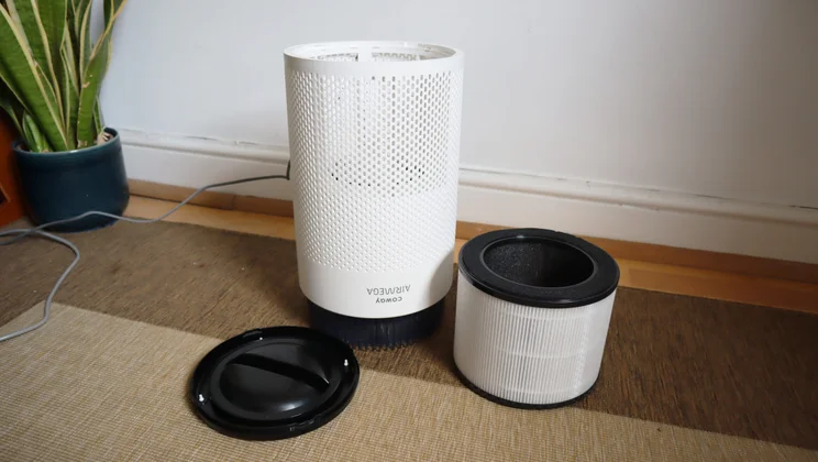 Coway Airmega 100 - wide shot of purifier disassembled and laid out on floor