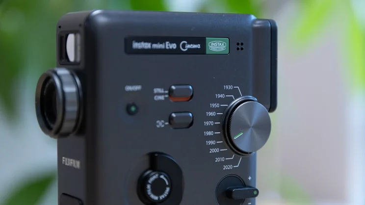 A closeup of the Instax Mini Evo Cinema's controls and Eras dial