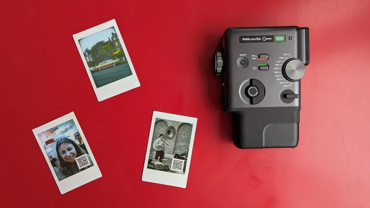 A bird's eye view of the Instax Mini Evo Cinema, alongside a series of printed photos
