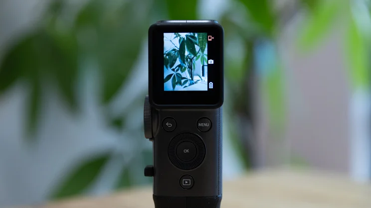 A closeup of the Instax Mini Evo Cinema's digital display and controls