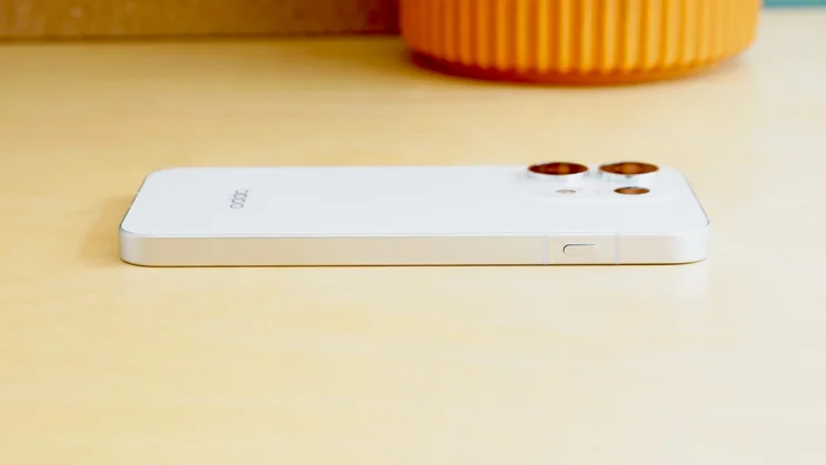 Oppo Reno 16 Pro face down on a table
