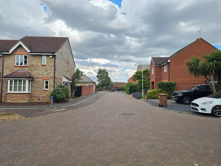 A quiet street with houses on both sides