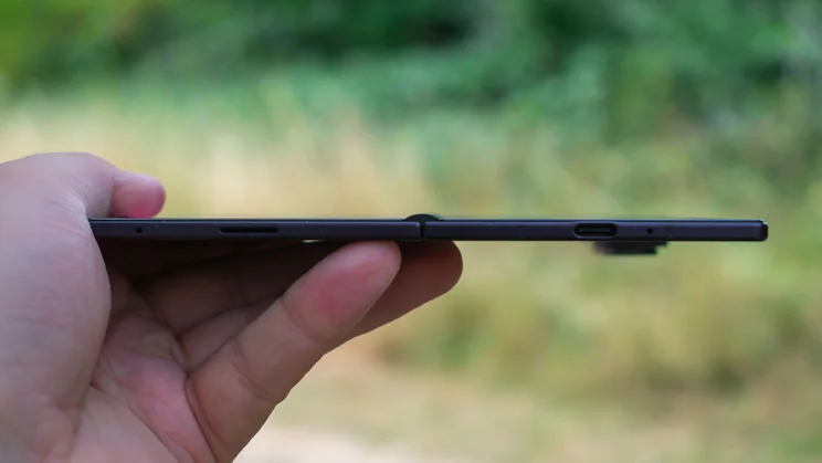 Samsung Galaxy Z Fold 8 Ultra unfolded in hand, bottom view